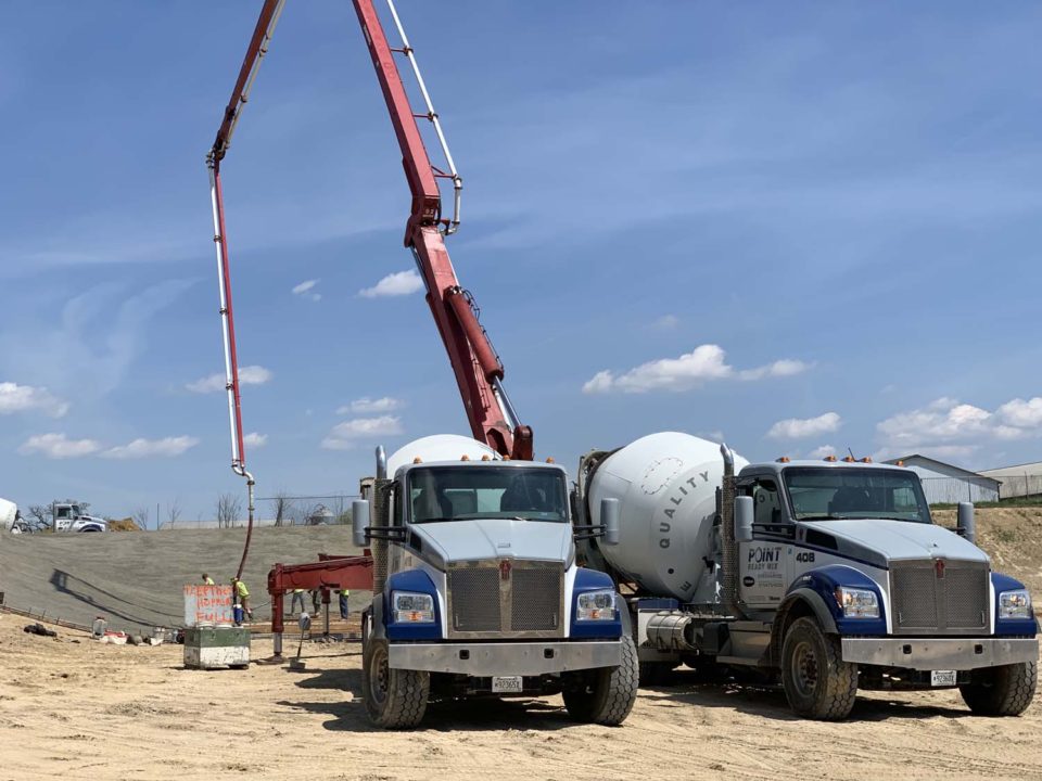 two cement trucks with pump
