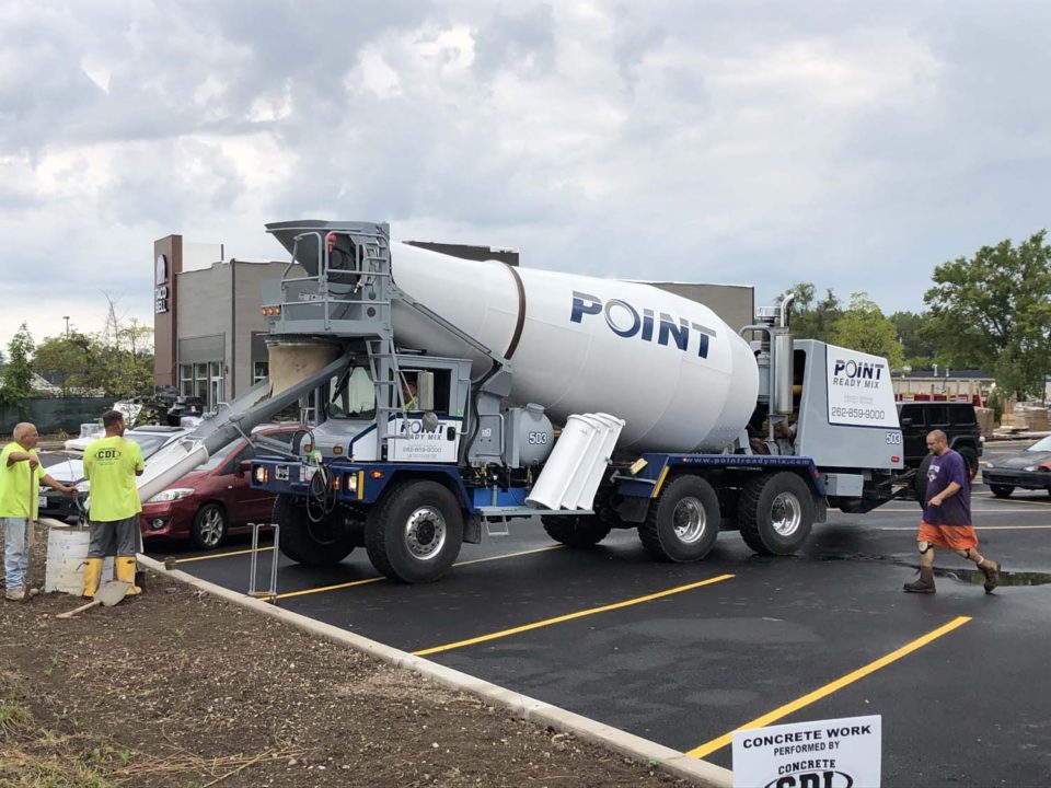 cement truck with workers