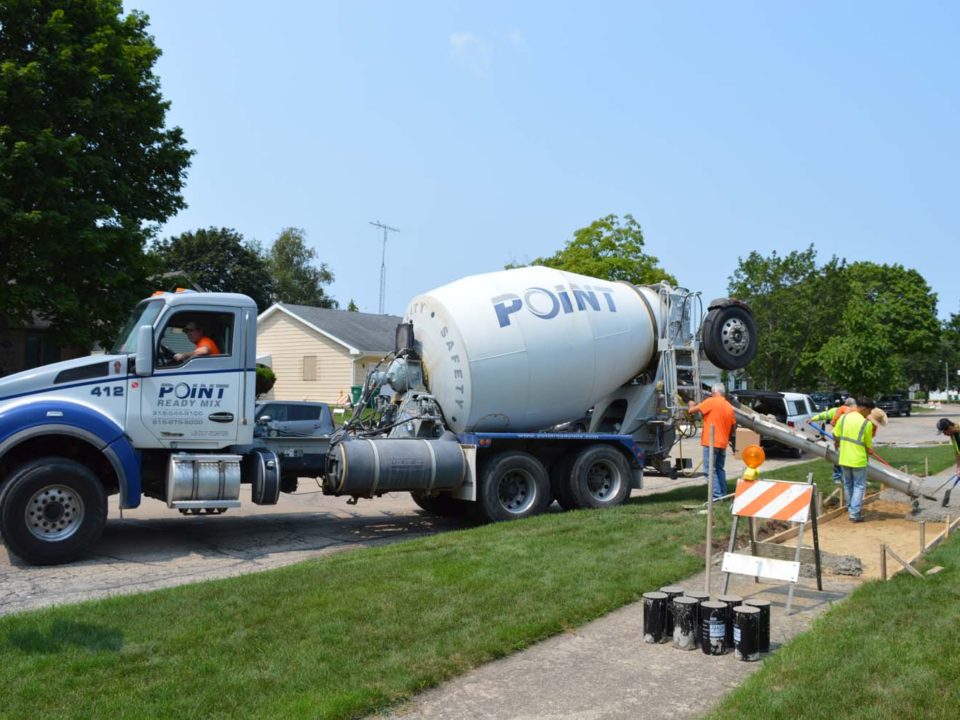 cement truck with workers